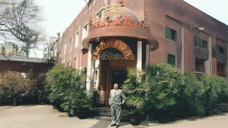 Dr. David Dharmadas at Tandoor Restaurant project site in Chengdu, China, consulting on Vastu-aligned design and architecture.